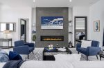 Relax in the Living room with the Smart TV and Fireplace Feature